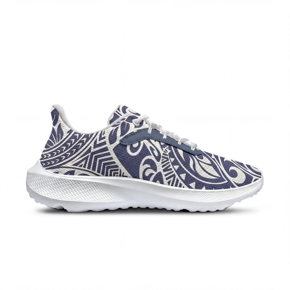 A pair of white and blue patterned sneakers with a textured sole.