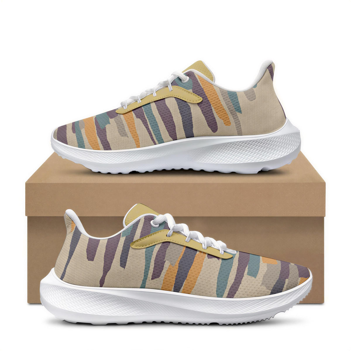 A pair of colorful sneakers with a camouflage pattern, displayed on top of a cardboard box.