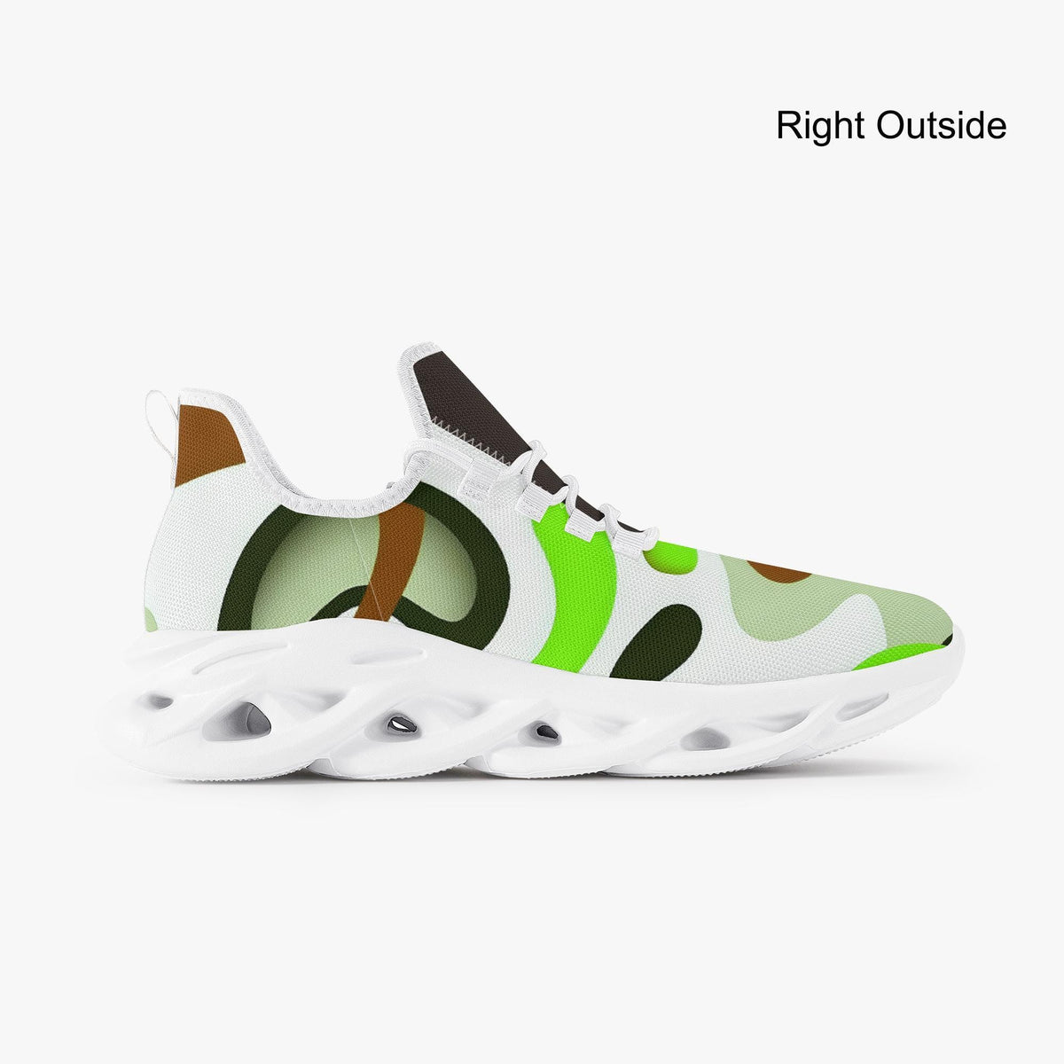 A white and green abstract shoe design with a pattern of circles and lines.