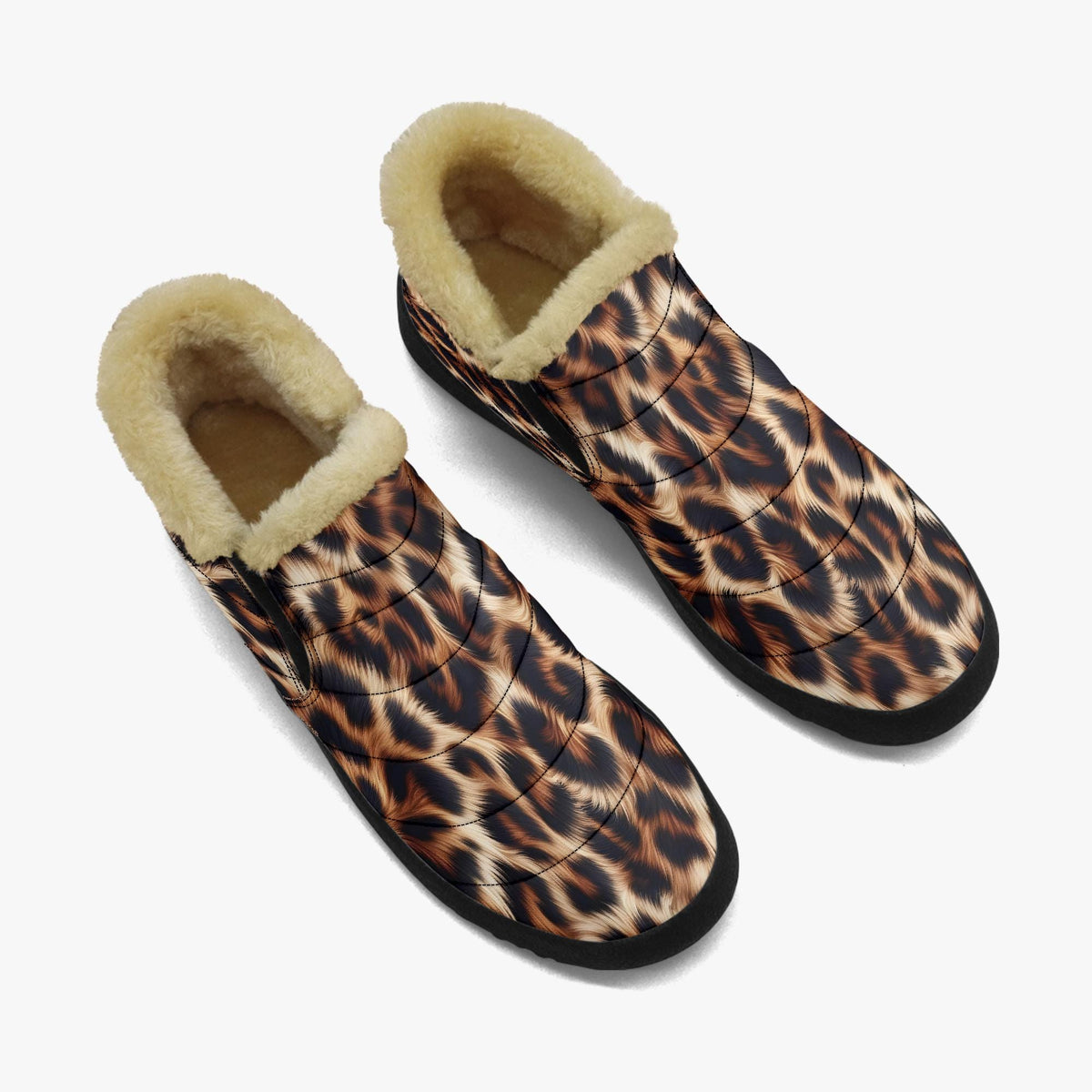 A pair of leopard print boots with fur lining.