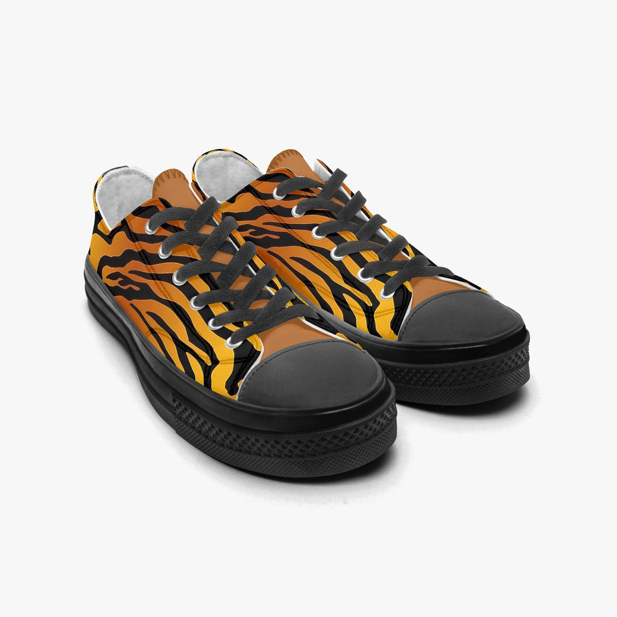 A pair of black and orange tiger-striped sneakers with black laces and soles.