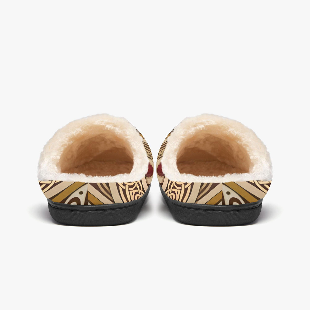 A pair of white slippers with a patterned design on the side.