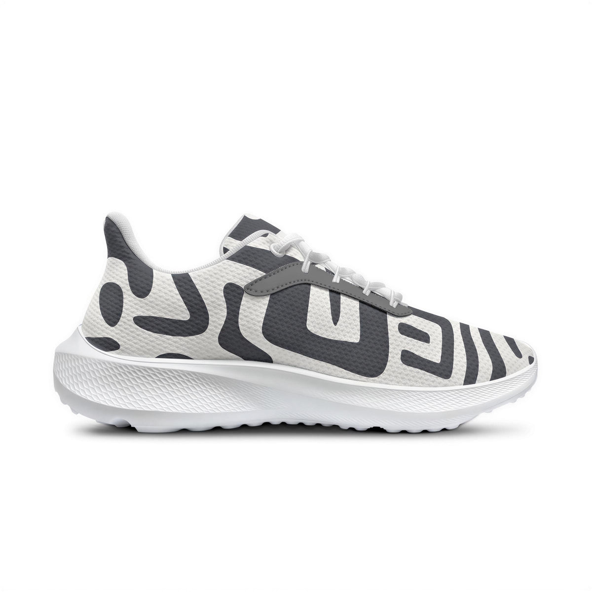 A white and black patterned sneaker with a textured sole.