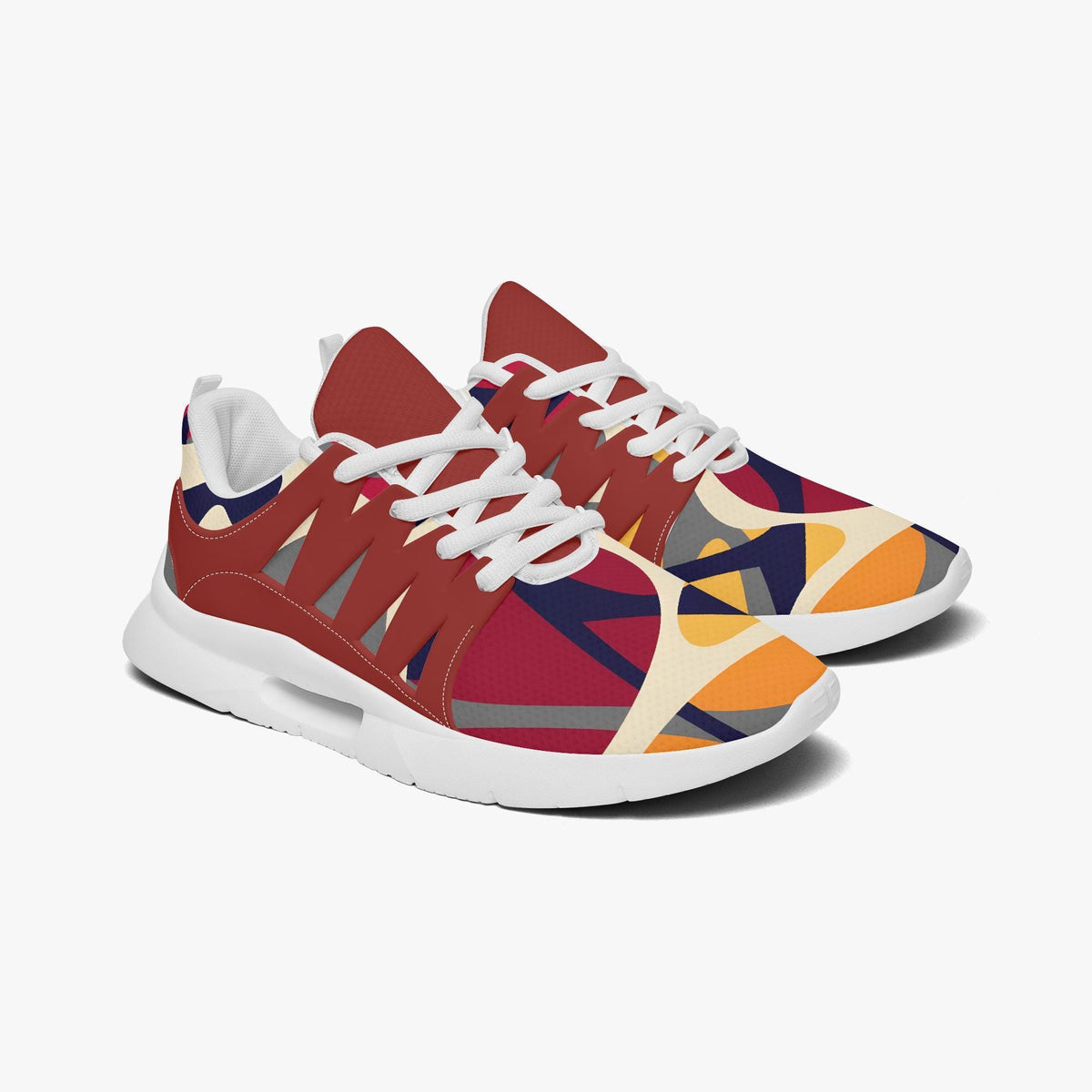 A pair of colorful sneakers with a geometric pattern on the side.