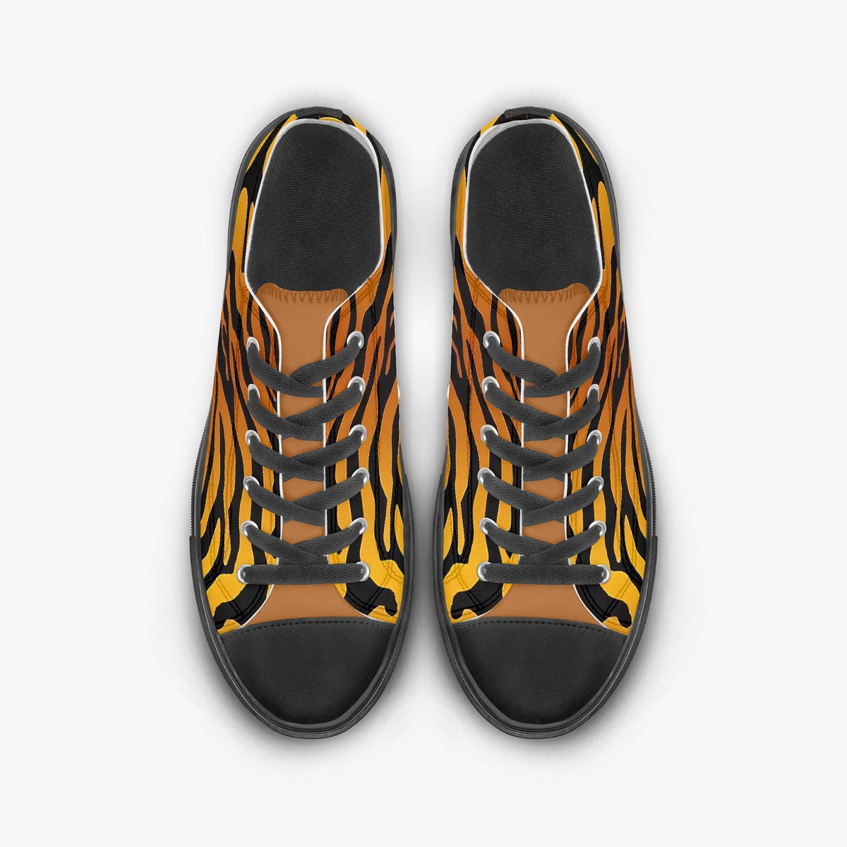 A pair of tiger-striped sneakers with black laces and soles.