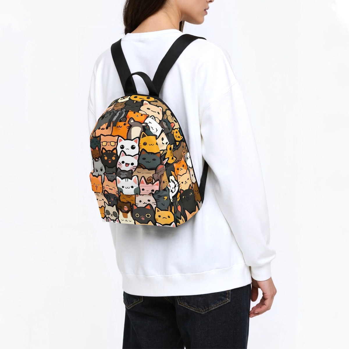 Man carrying cat print backpack over his shoulder, side view