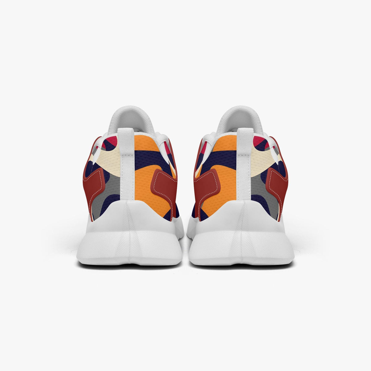 A pair of colorful sneakers with a patterned design on the back.