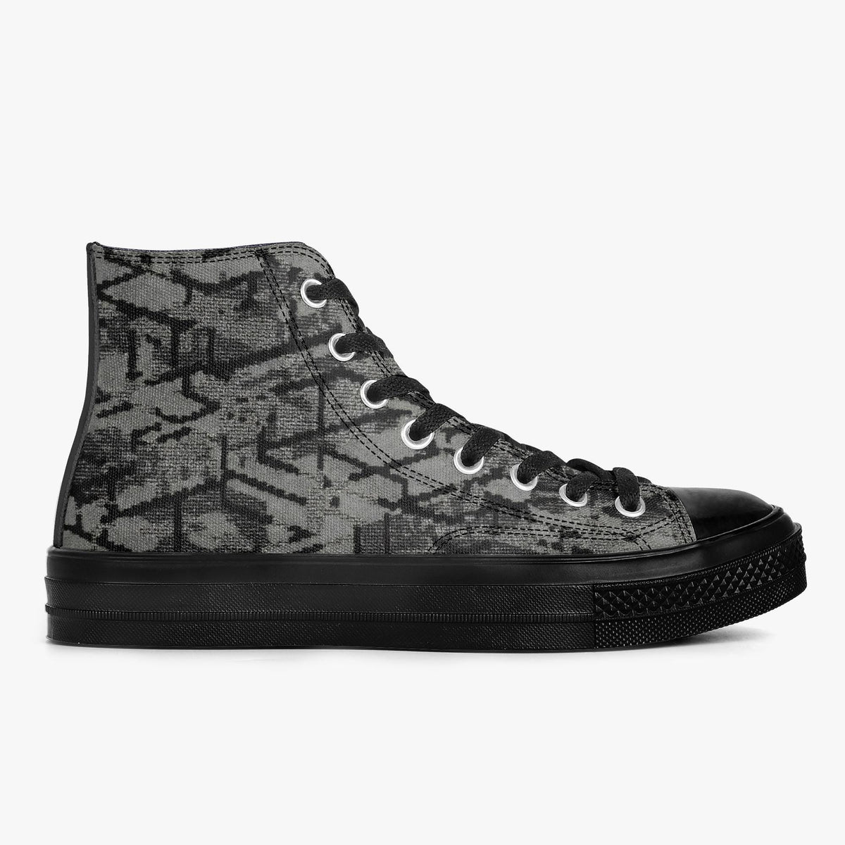 A black and grey high-top sneaker with a distinctive patterned design.