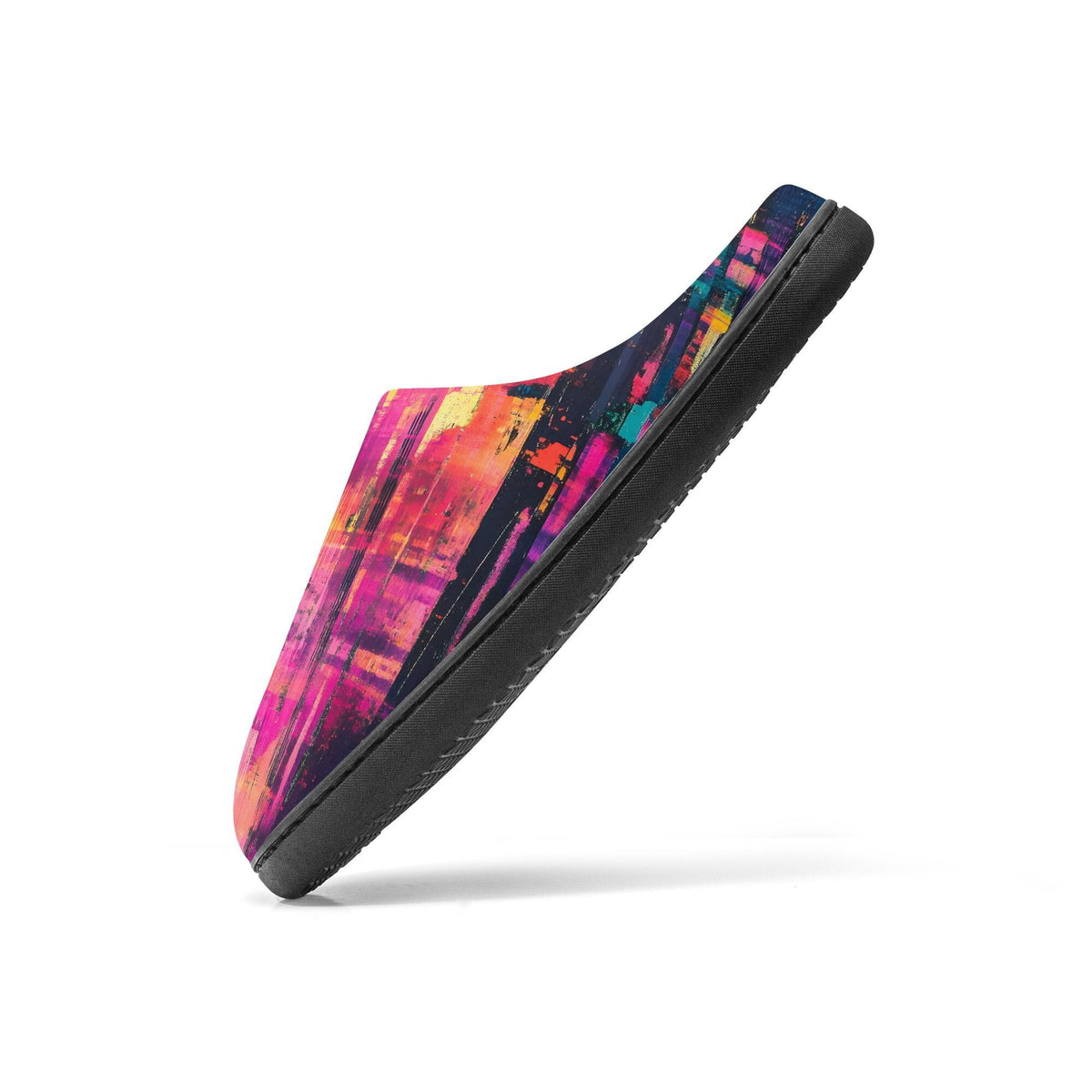 A colorful, abstract patterned shoe is shown against a white background.
